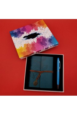 Ballpoint Pen And Blue Notebook